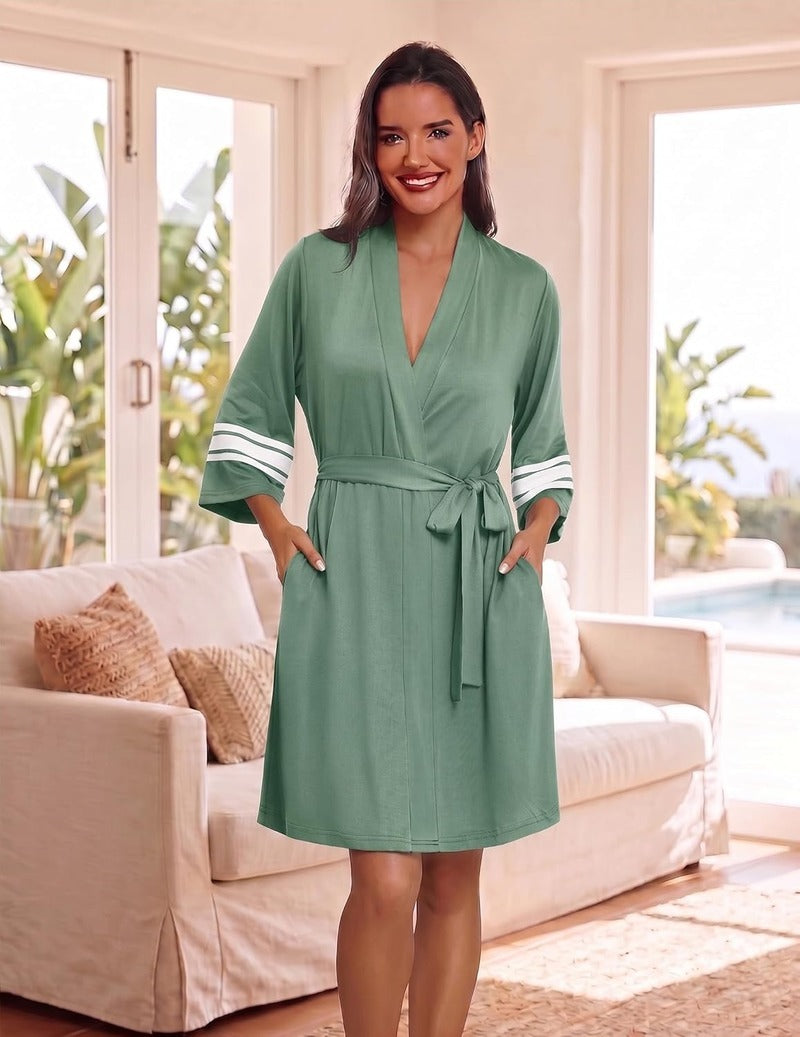 Green knit short bathrobe with V-neck, 3/4 sleeves, and waist tie belt