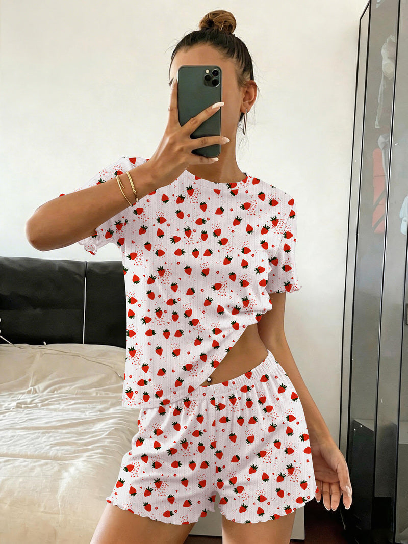 Ribbed crop top and shorts pajama set in white with red fruit print, elastic-waist shorts