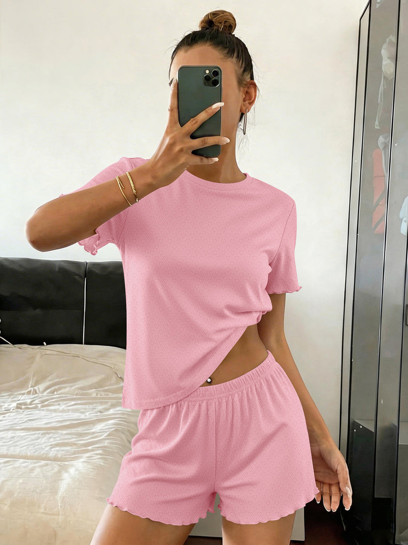 Solid pink crop pajama top and shorts set with matching elastic waistband