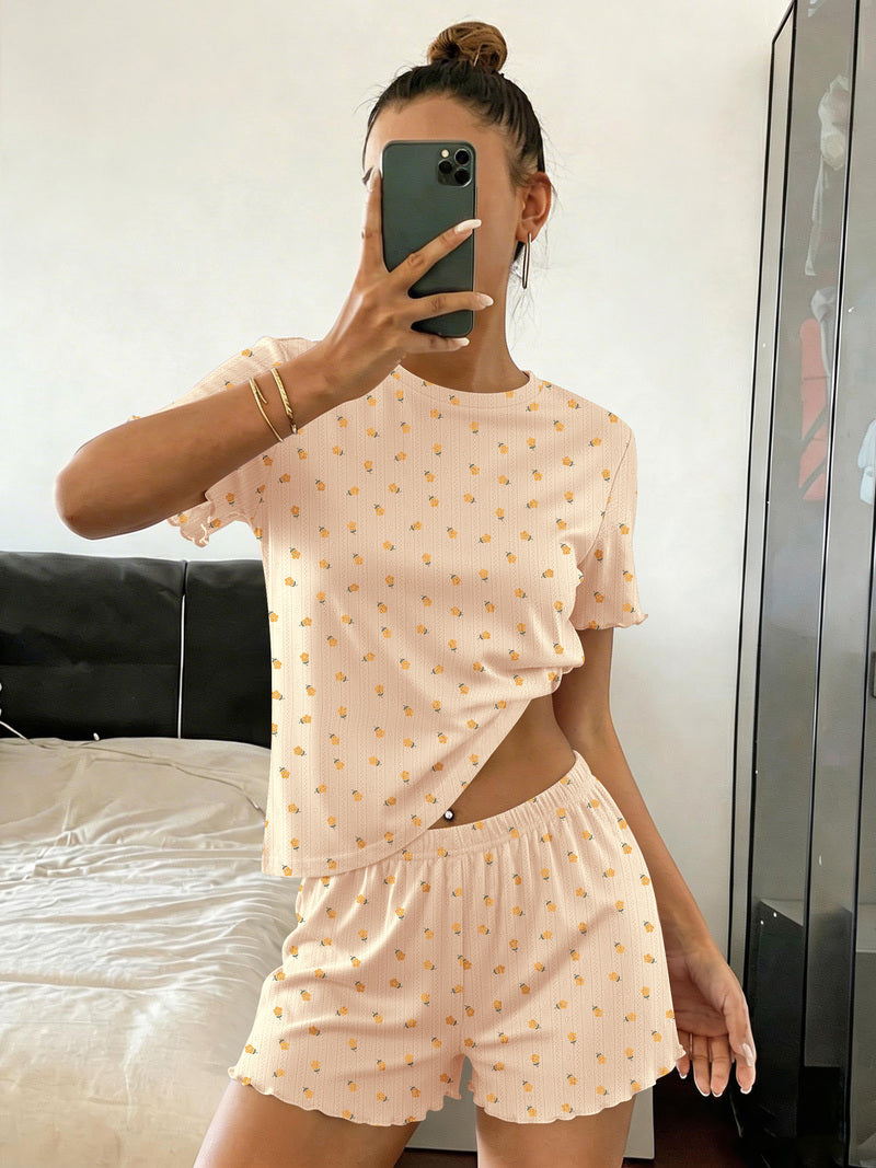 Cream crop pajama top and shorts set with tiny bow-pattern all over