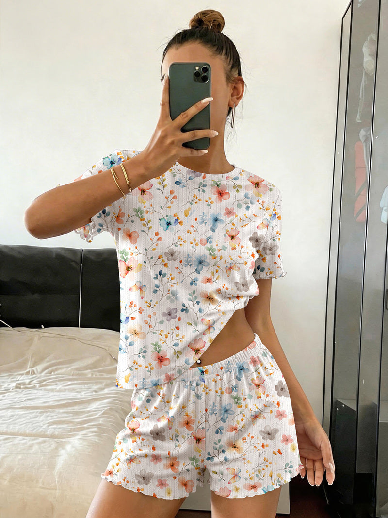 Floral-print crop pajama top and shorts set in white with blue and orange flowers