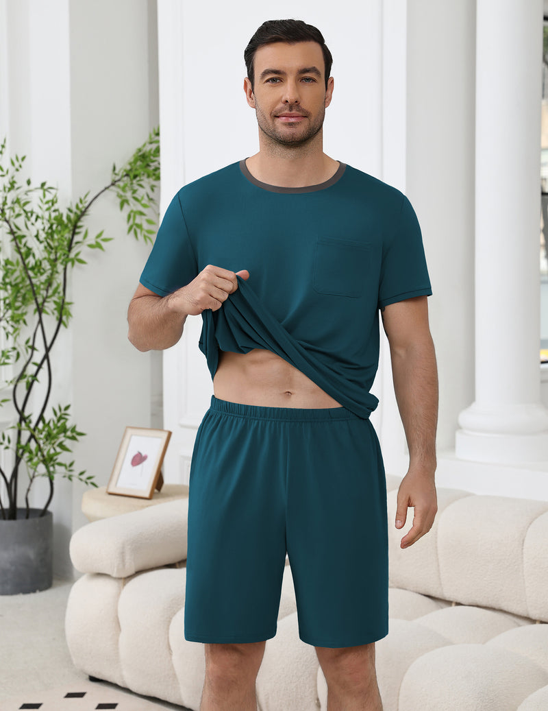 Men's short-sleeve pajama set, teal top and shorts, front view with draped fabric.