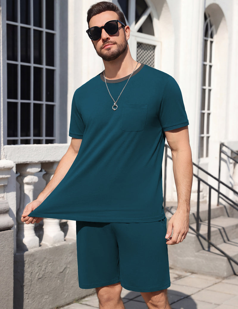 Men's short-sleeve pajama set, deep teal top and shorts, front view on steps.