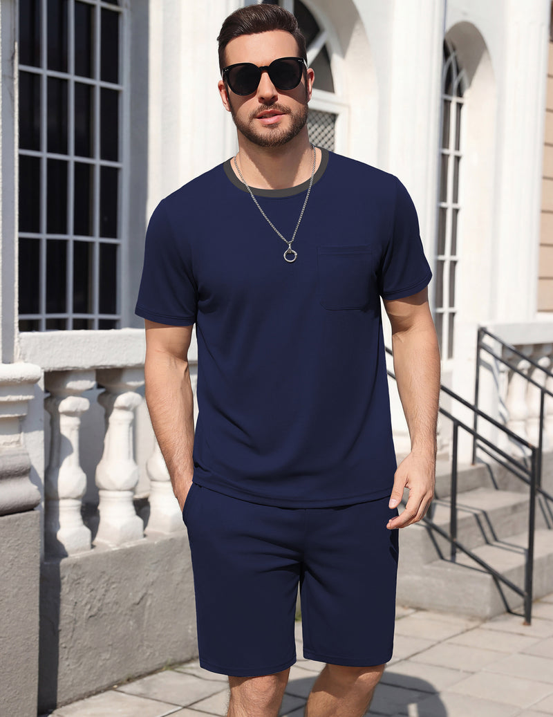 Men's short-sleeve pajama set, navy-blue top and matching shorts, standing front.