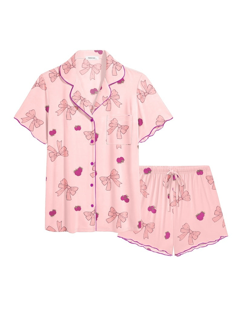 Light pink ruffle button-up pajama set with bow print and matching drawstring shorts