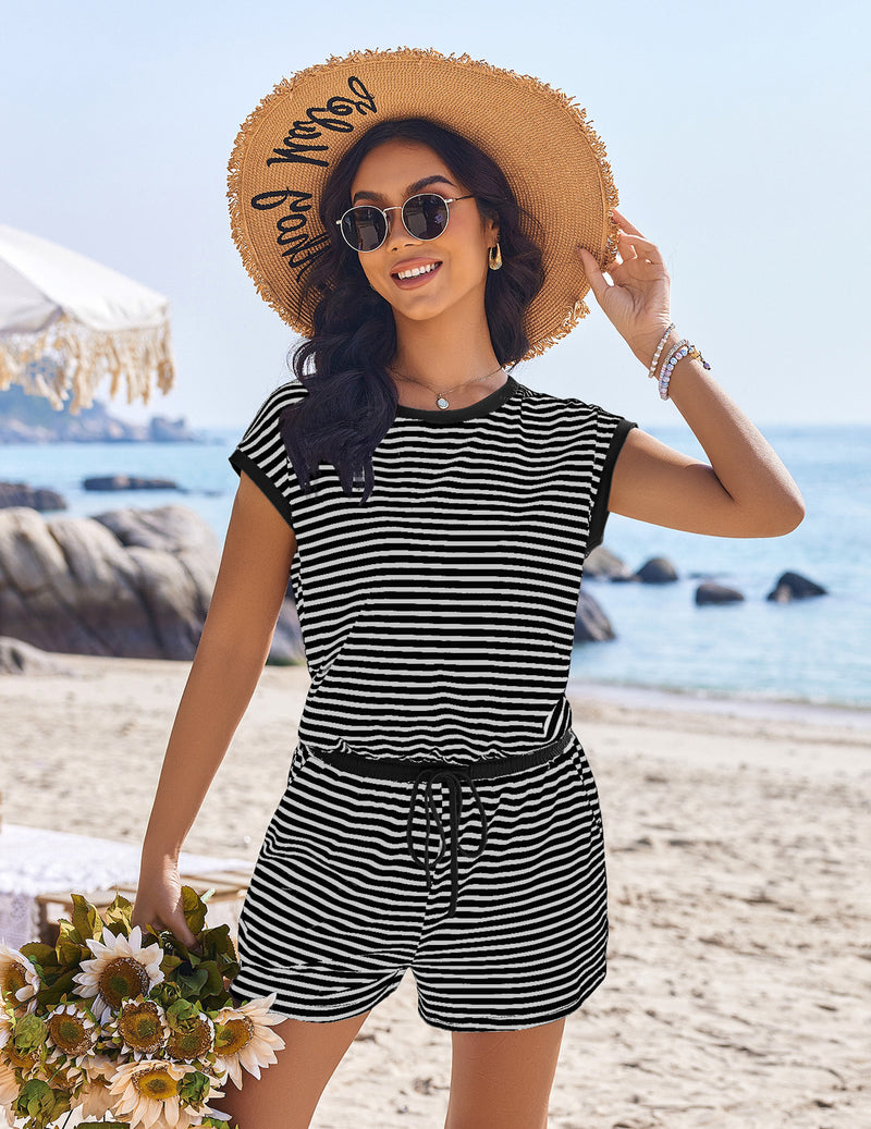 Black-and-white striped cap-sleeve romper with drawstring waist and pockets