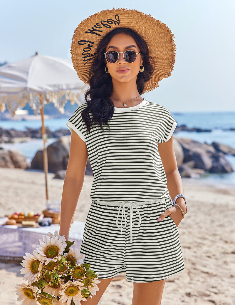 Green-and-white striped cap-sleeve romper with drawstring waist and pockets