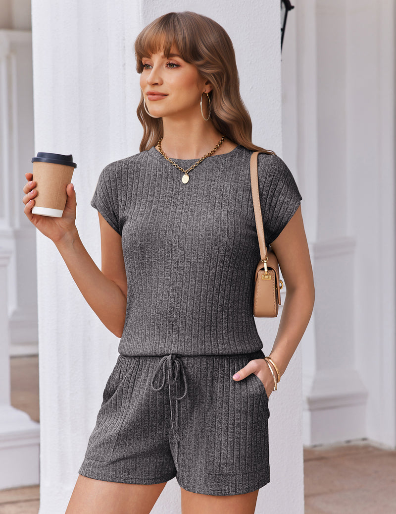 Medium grey cap-sleeve crewneck short romper with drawstring waist and ribbed fabric