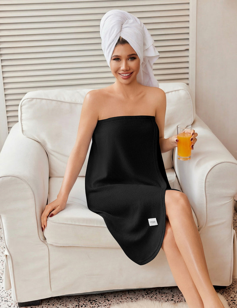 Black waffle-knit spa robe bath wrap with strapless neckline and hood