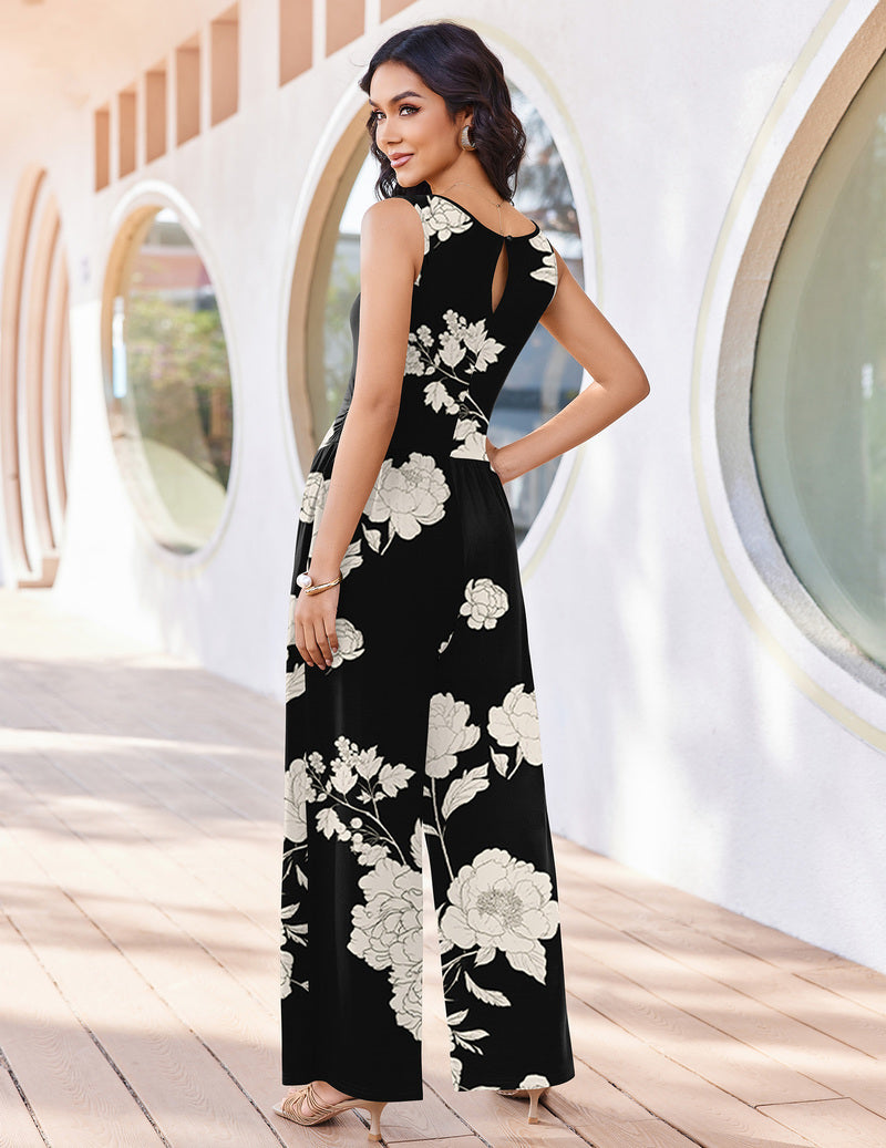 Black sleeveless wide-leg jumpsuit with white floral print and smocked waist