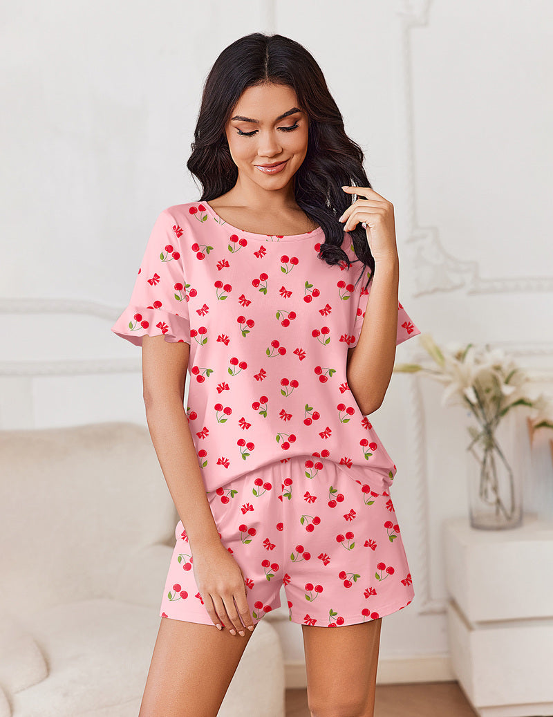 Women’s cotton pajama set with ruffle sleeve top and matching shorts, cherry print on pink