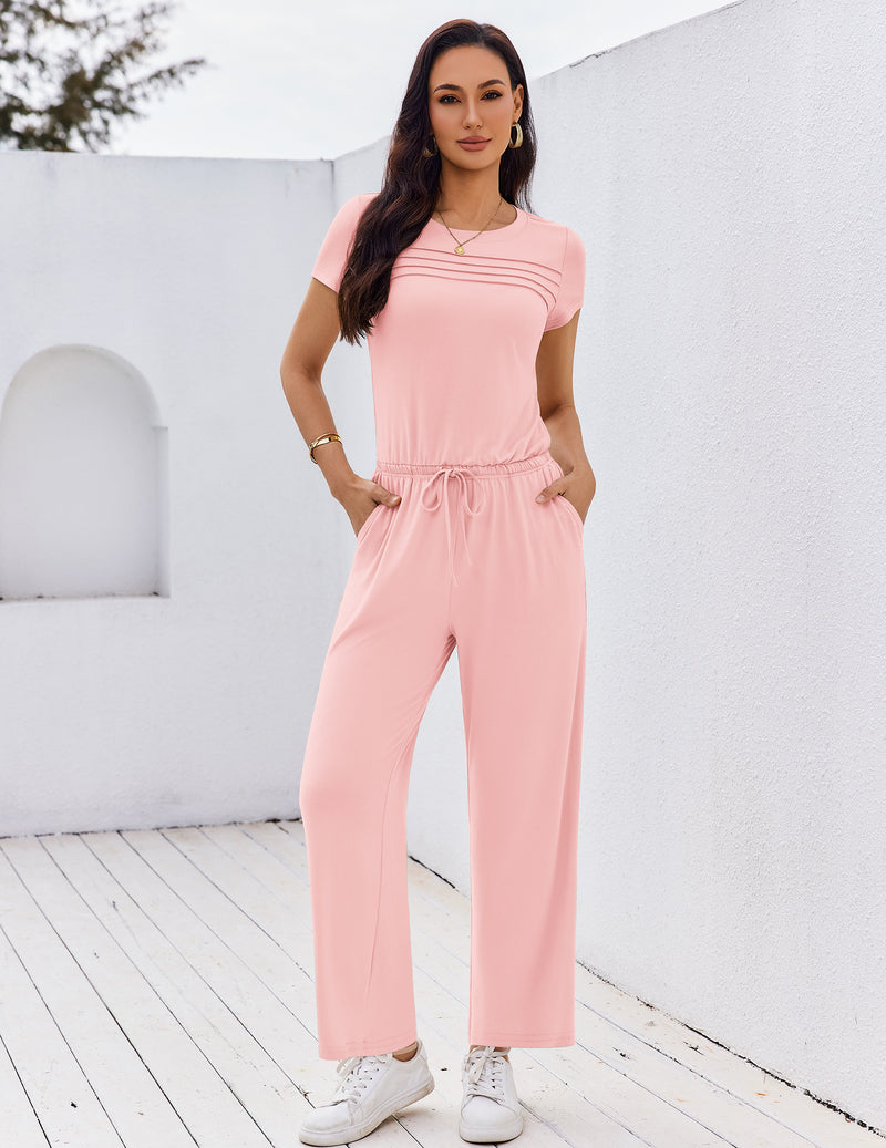 Light pink short-sleeve round-neck jumpsuit with pleated front and wide-leg pants