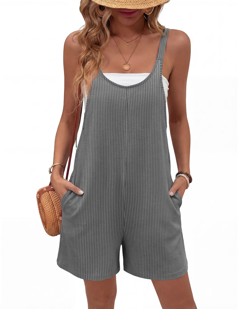 Dark grey sleeveless ribbed knit romper shorts jumpsuit with pockets, wide straps.