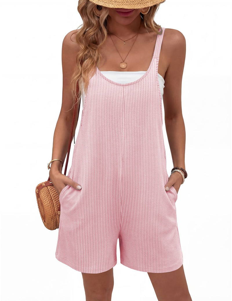Light pink sleeveless ribbed knit romper shorts jumpsuit with pockets, wide leg fit.