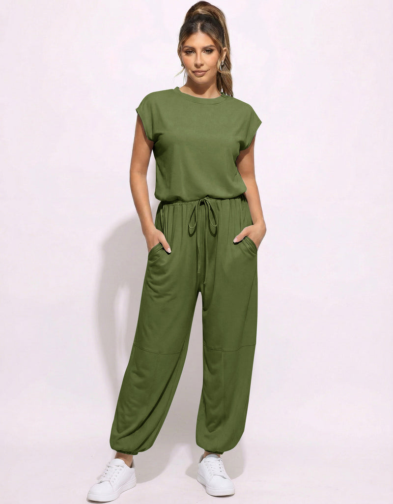 Olive green one-piece jogger jumpsuit with drawstring waist and tapered legs