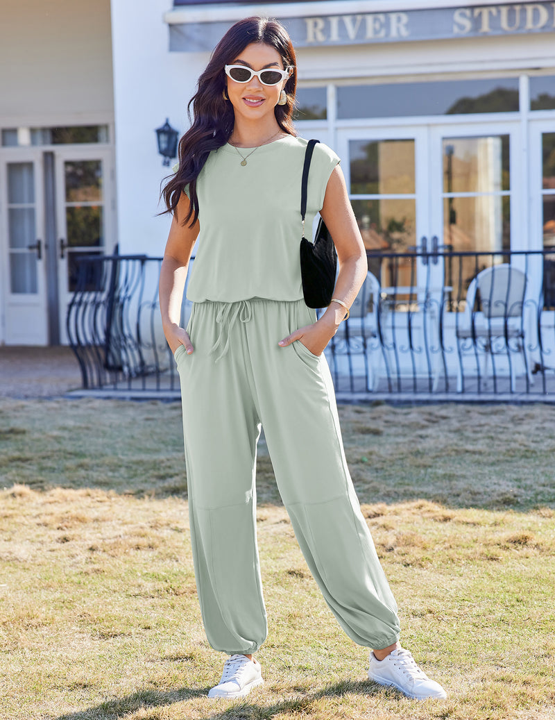 Light mint green one-piece jogger jumpsuit with drawstring waist and wide legs