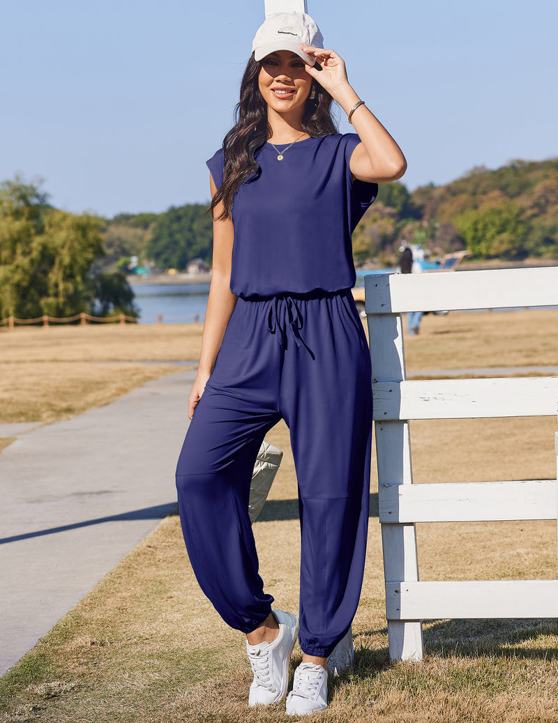 Dark blue casual jogger one-piece jumpsuit with drawstring waist and roomy wide legs