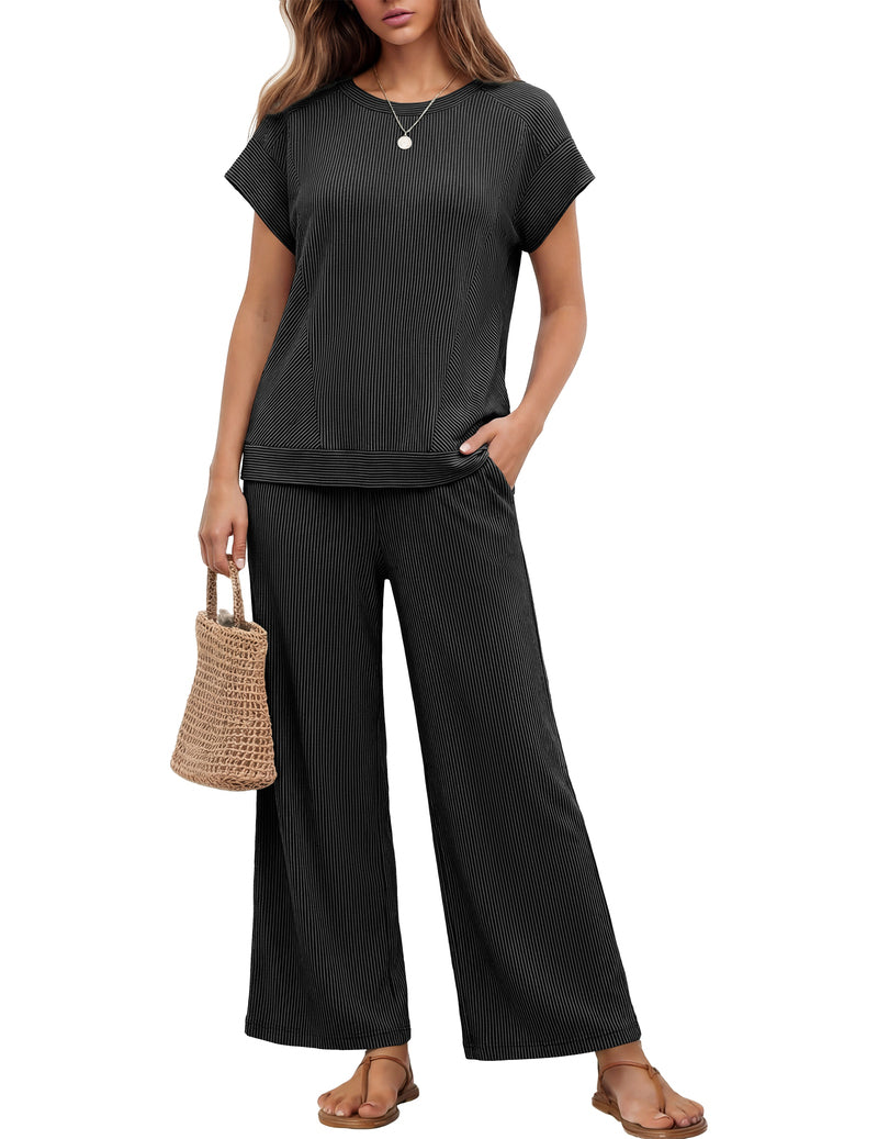 Dark black ribbed short-sleeve top with matching wide-leg pants, relaxed two-piece set.