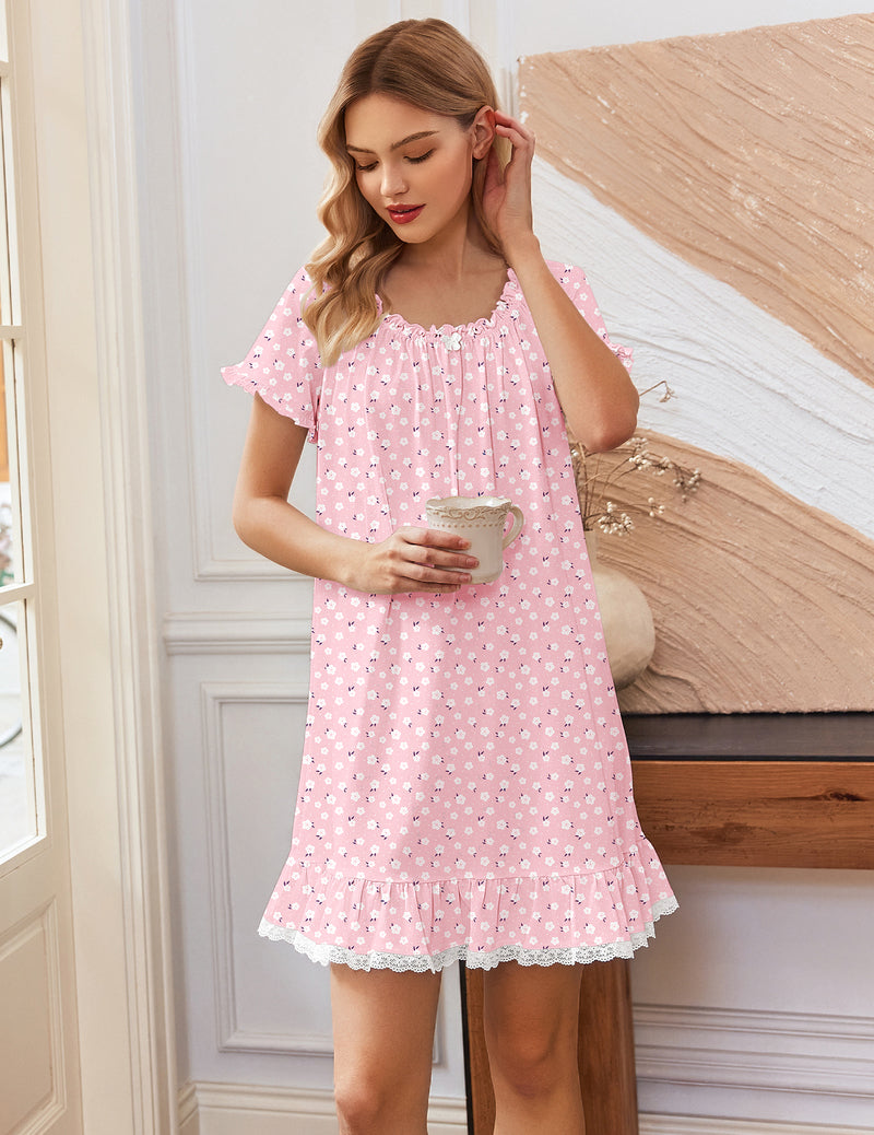 Pink floral cotton nightgown with lace-trim neckline, short sleeves, and ruffled hem
