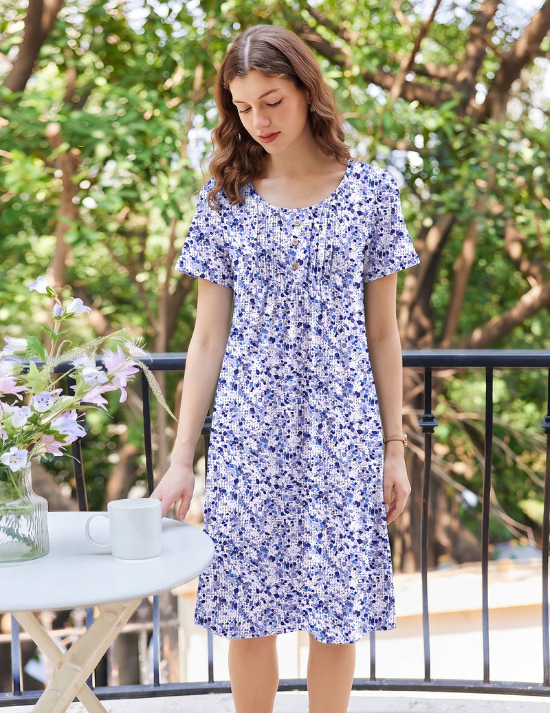 Blue and white floral short-sleeve mumu dress with rounded neckline and relaxed fit
