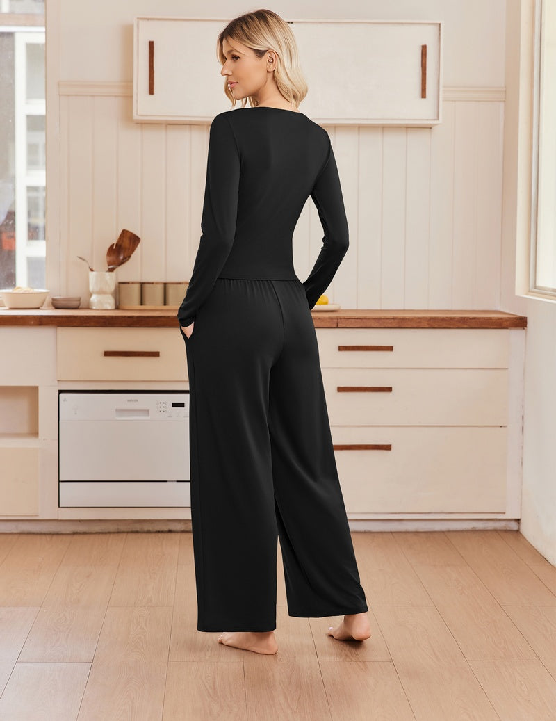 Black ruched crew-neck slim top and wide-leg pants set, long sleeves, back view.