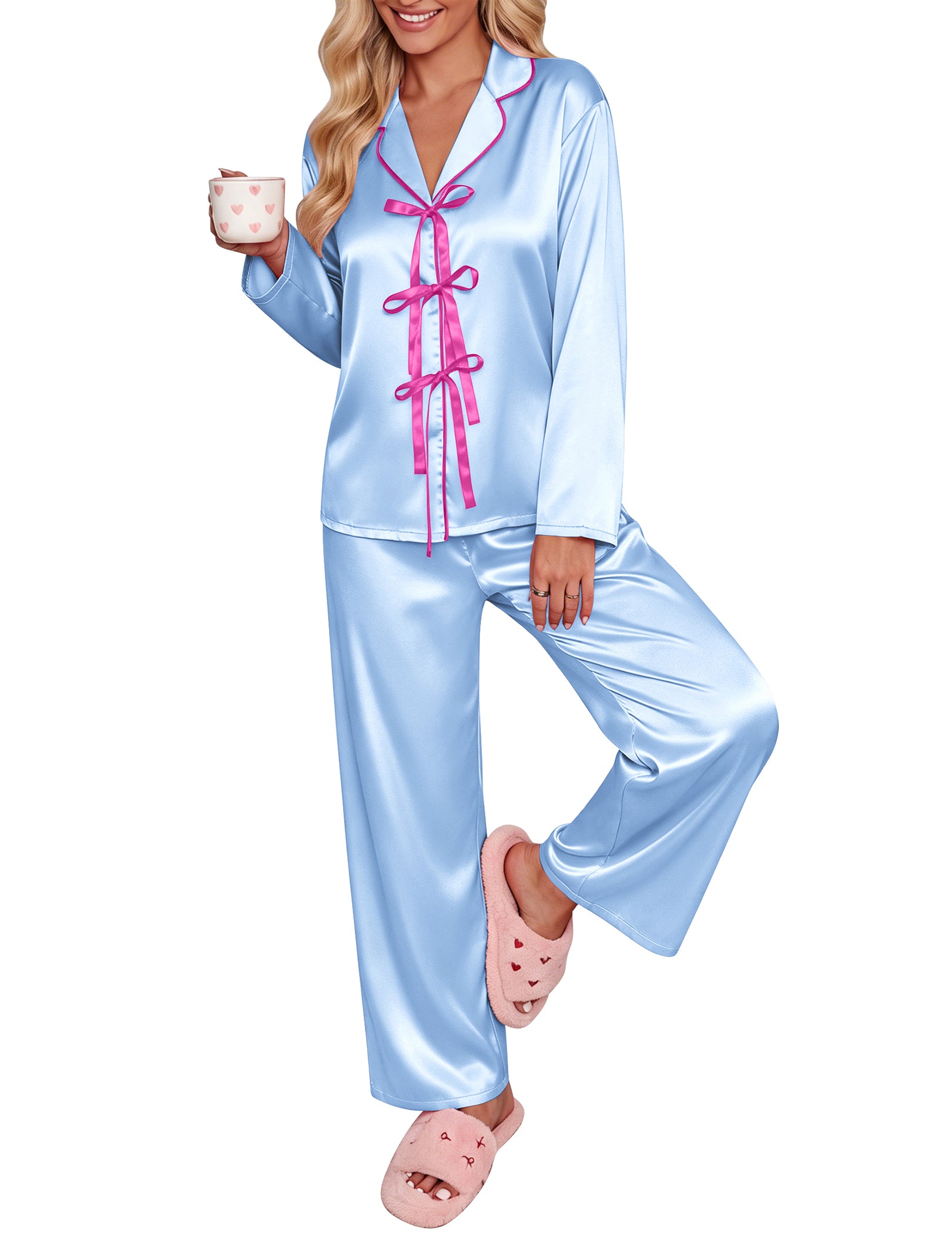 Light blue satin pajama set with long sleeves, notch collar, and pink bow-tie ribbon