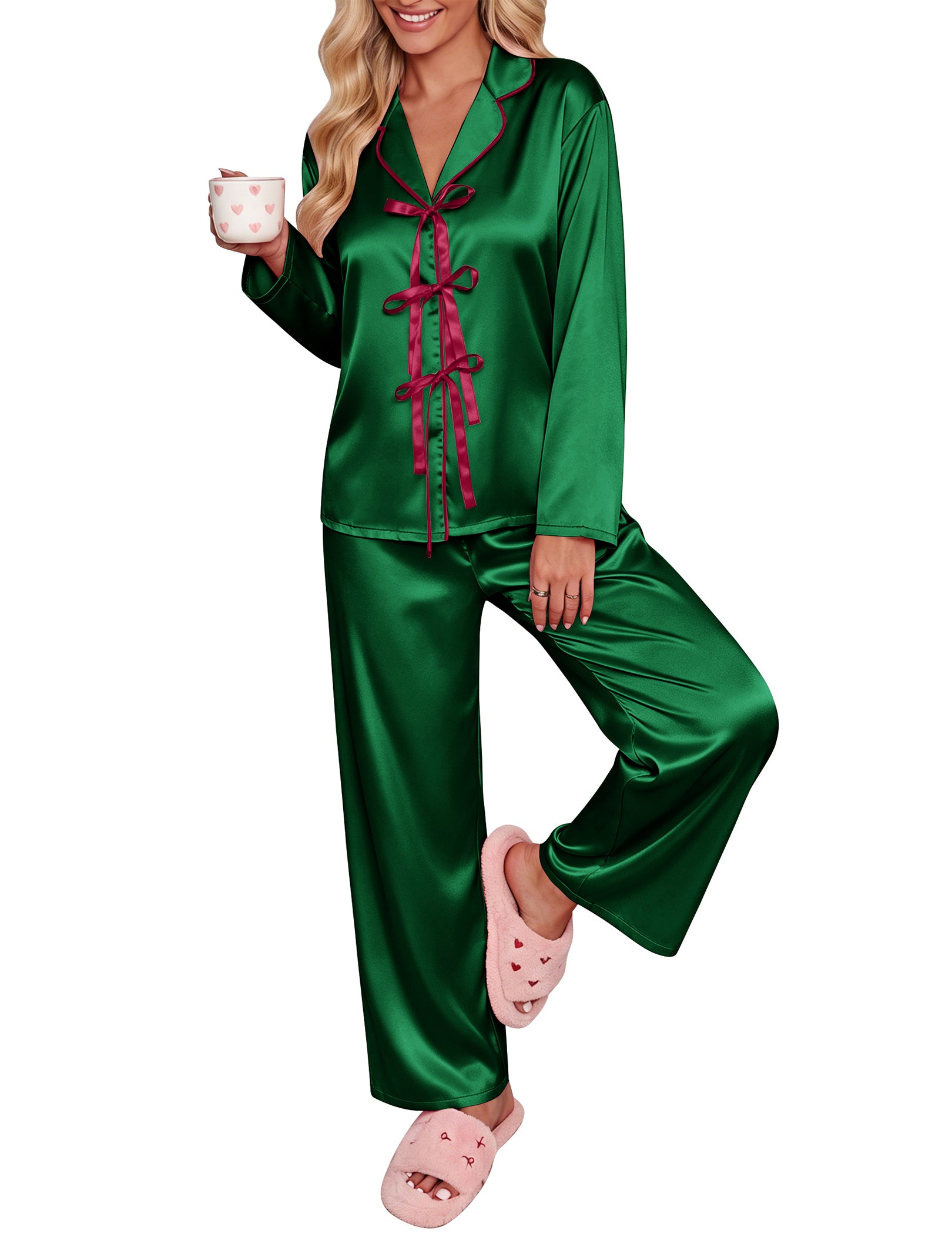 Green satin pajama set with long sleeves, notch collar, and dark bow-tie ribbon