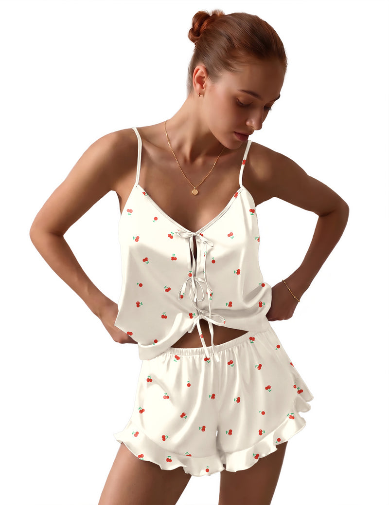Satin bow-tie pajama set in white with red cherry print and ruffled shorts