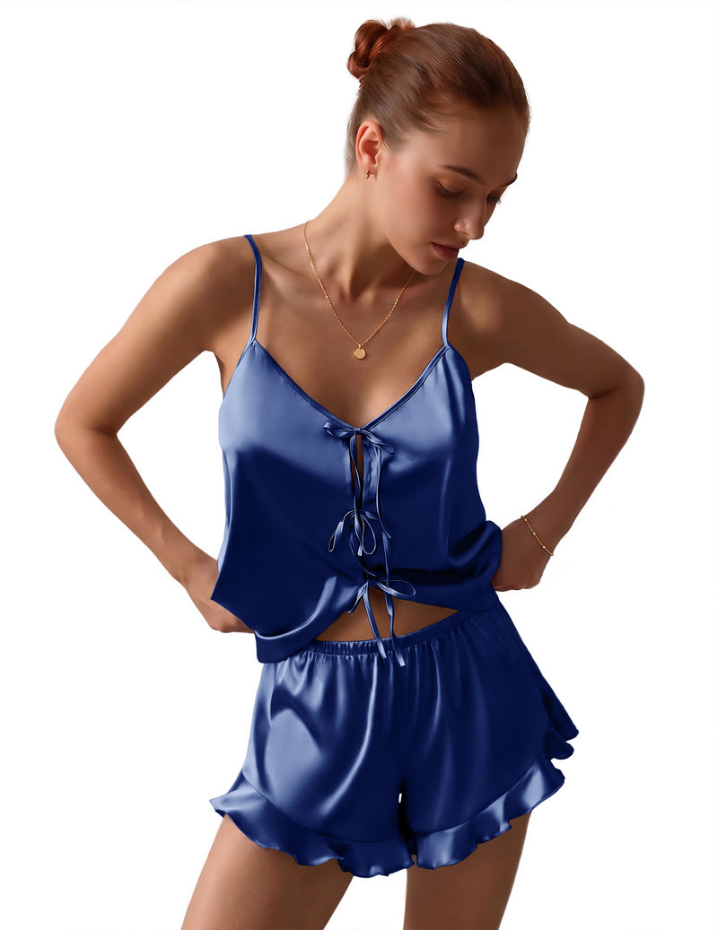 Navy satin pajama set with bow-tie front cami and matching ruffled shorts