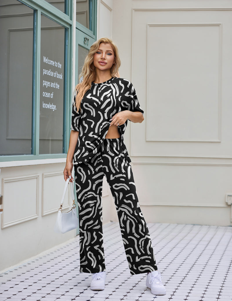 2-piece lounge set in black and white zebra print: short-sleeve top and wide-leg pants