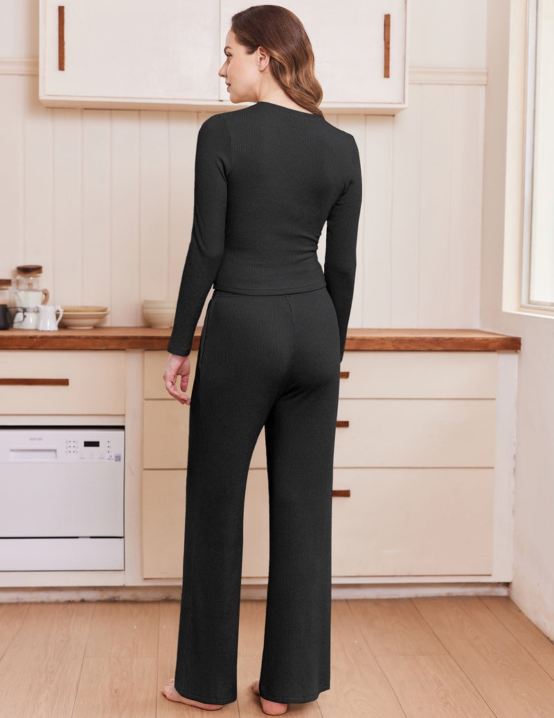 Two-piece lounge set with long-sleeve crew top and wide-leg pants in black, back view