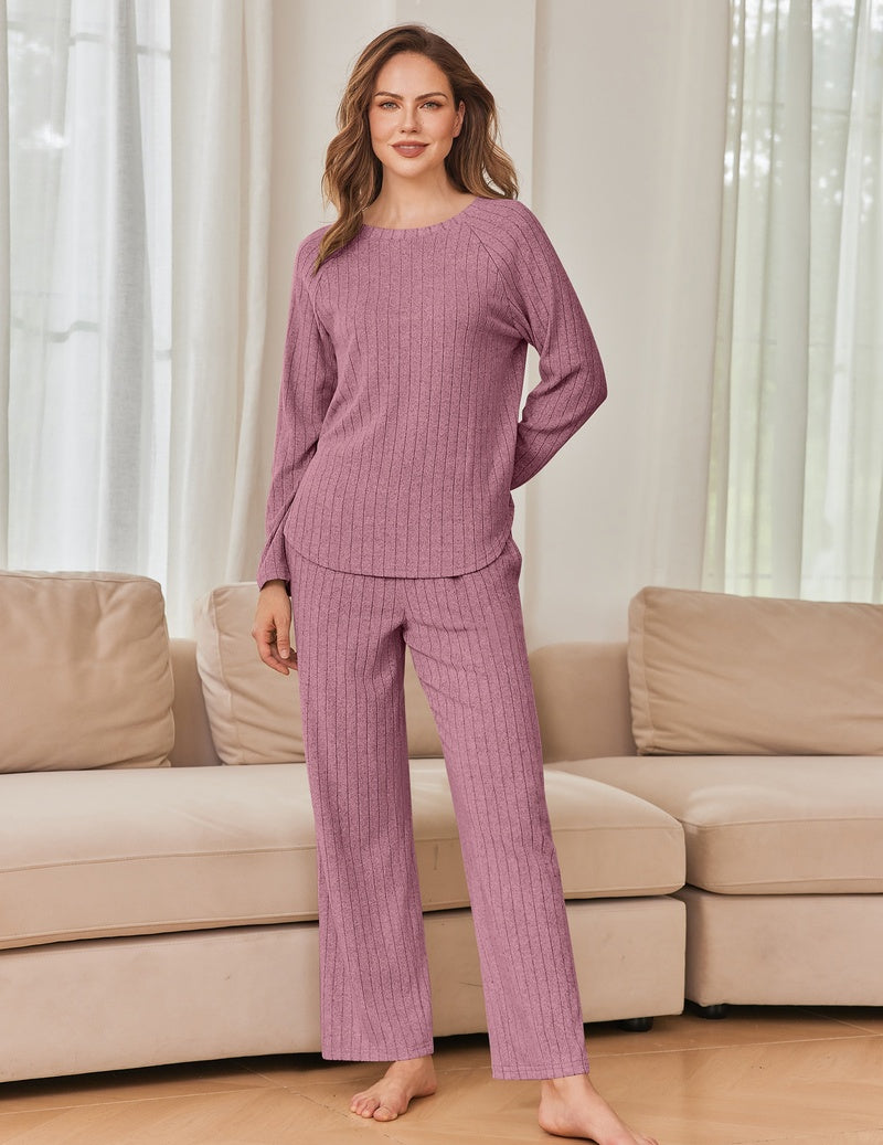 Dusty rose ribbed knit lounge set, long-sleeve crewneck top and wide-leg pants.