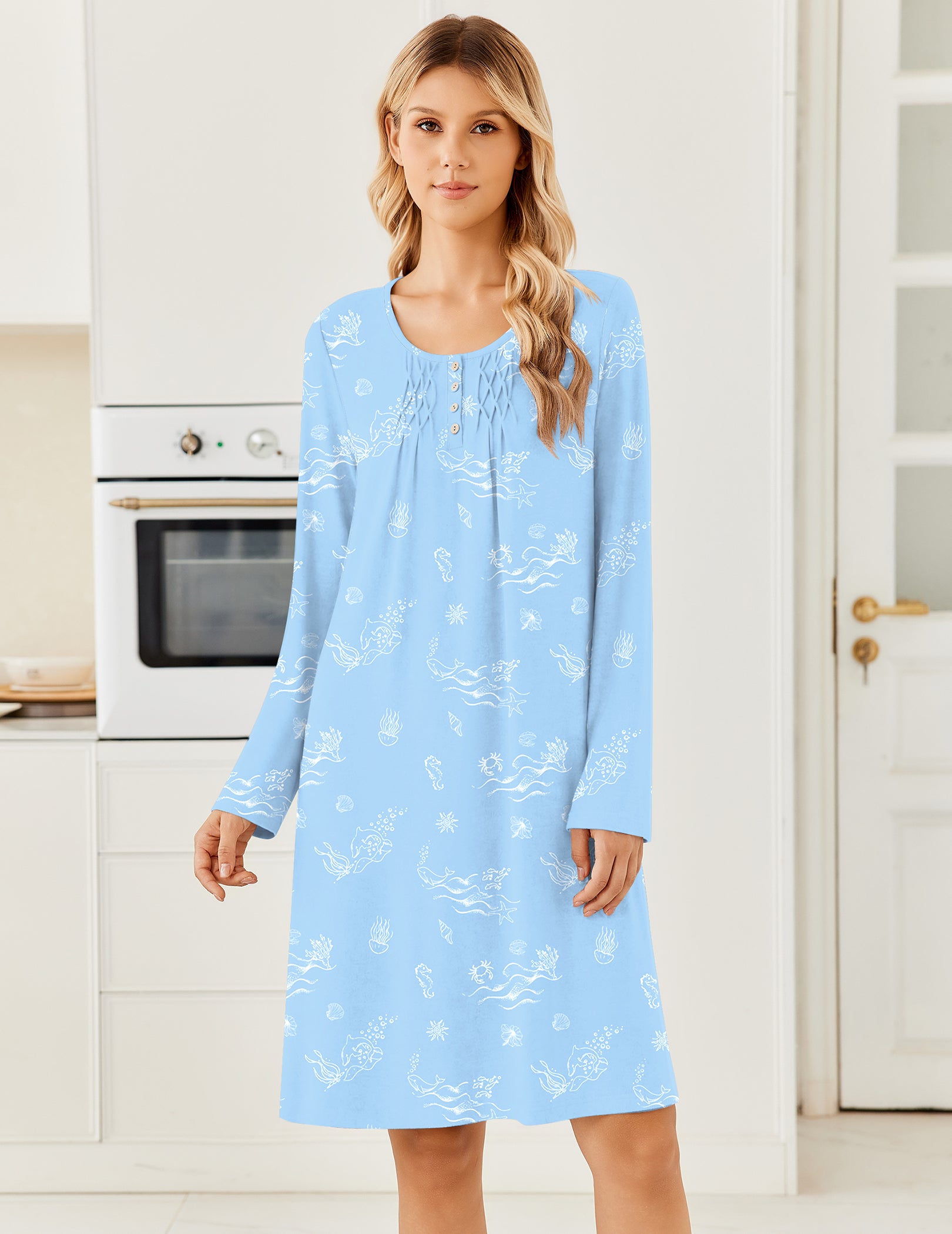 Light blue long-sleeve knit nightgown with henley buttons and pleated neckline bib