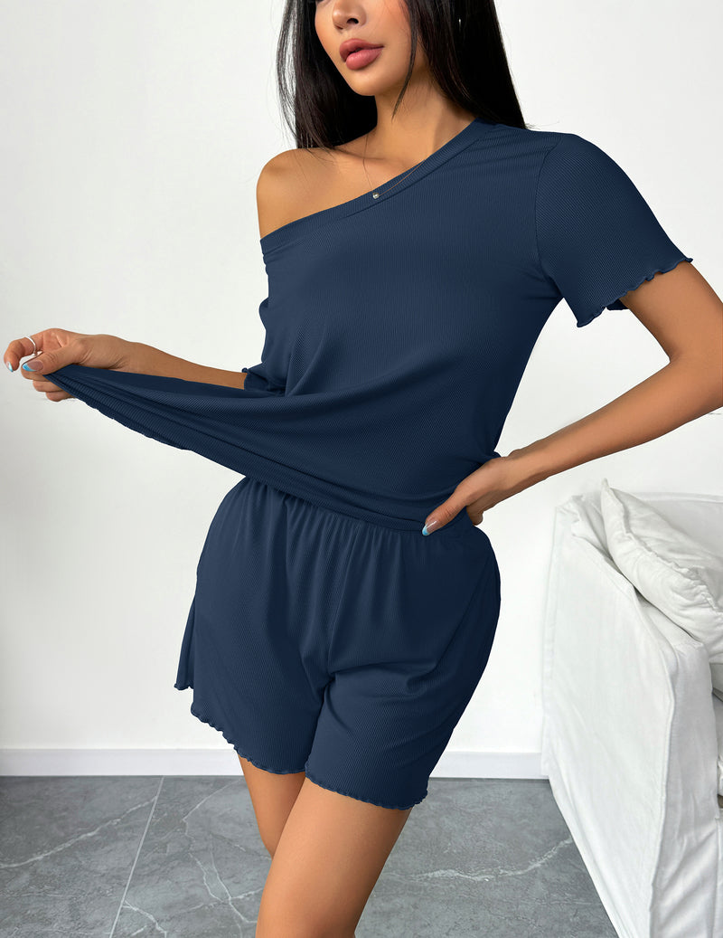Navy short sleeve pajama set with elastic-waist shorts and soft drape