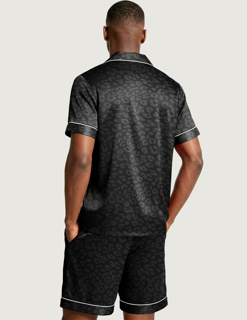 Black silk satin short-sleeve pajama set with allover pattern and matching shorts