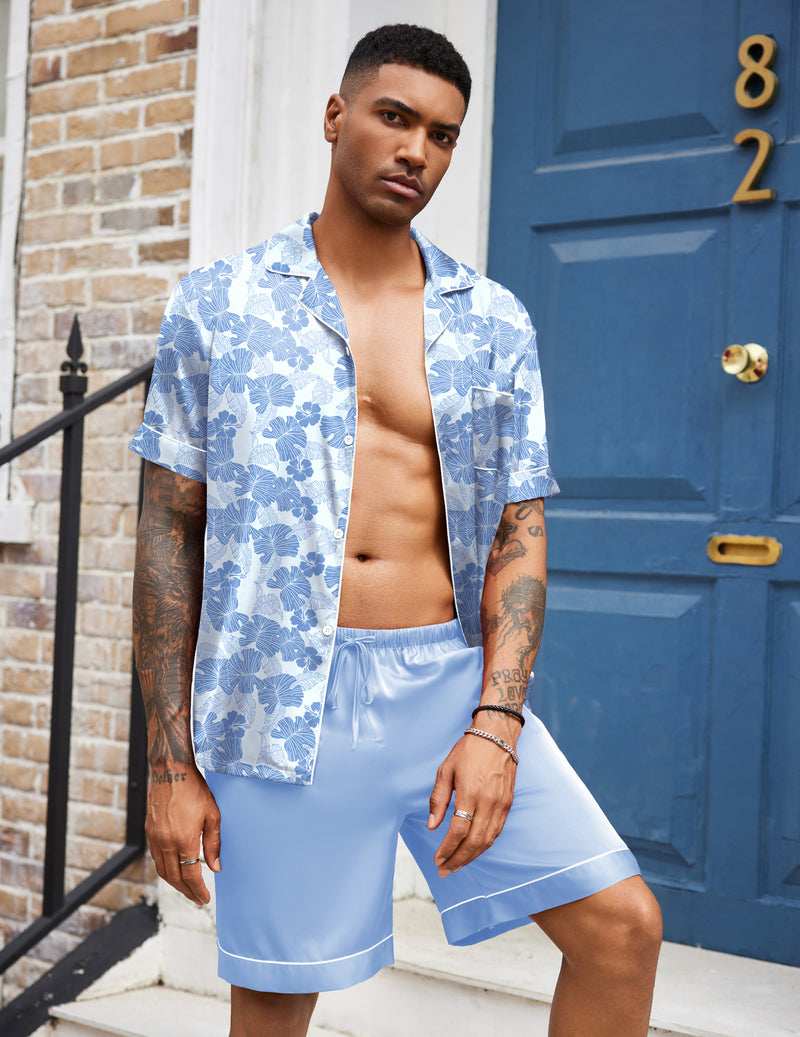 Light blue silk satin pajama set with short-sleeve button-up shirt and matching shorts