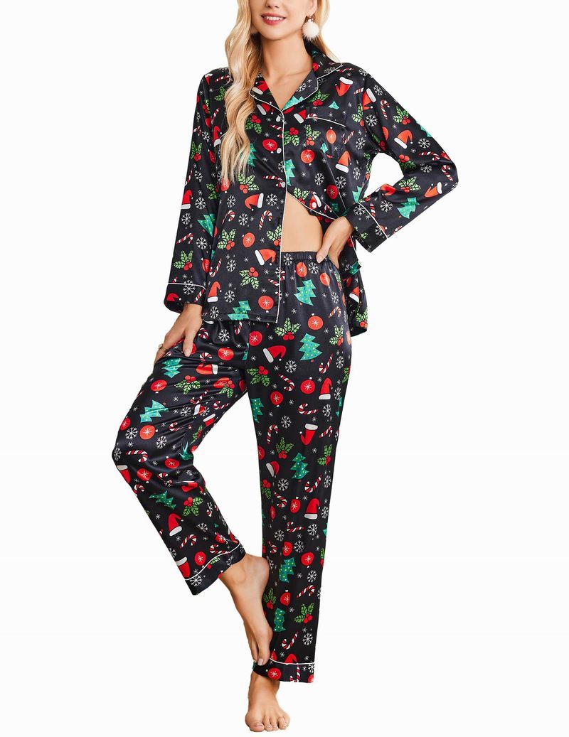 Black Christmas satin pajama set with colorful holiday icons, button-front long sleeve top and pants