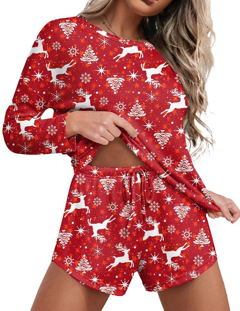 Red festive lounge set with reindeer print long-sleeve top and drawstring shorts