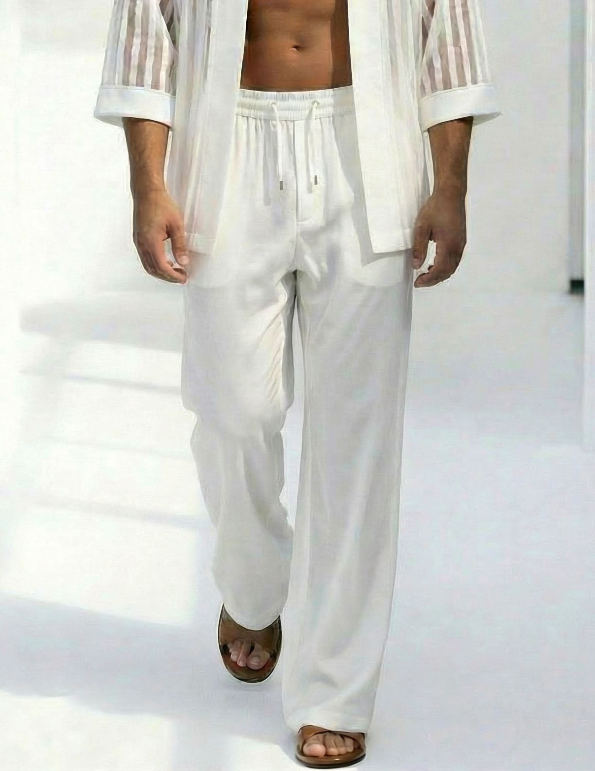 White sheer pants with elastic drawstring and part of striped kimono robe