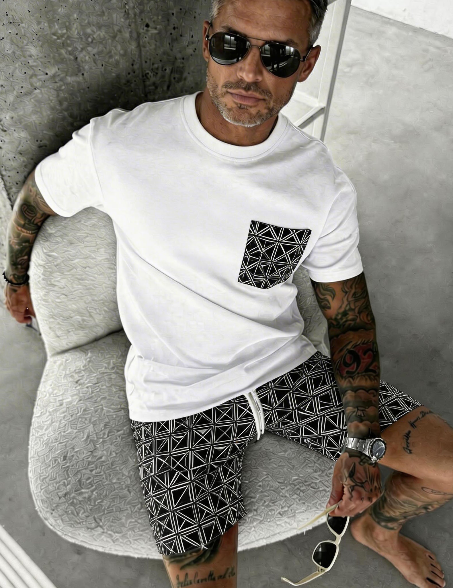 White pocket tee & shorts set with geometric line print pocket and drawstring shorts