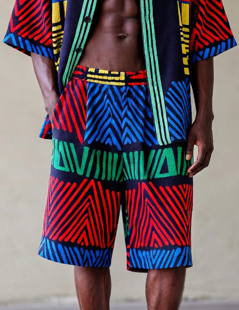 African print shorts with elastic waistband and bold striped pattern in blue red green