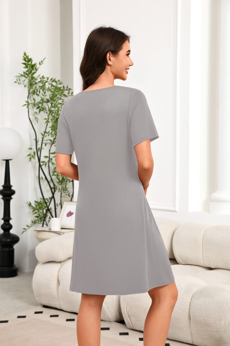 Women¡¯s light gray short-sleeve house dress, back view with seam details