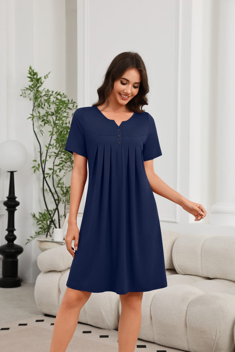 Women¡¯s navy V-neck short-sleeve house dress with button placket and pleated bodice