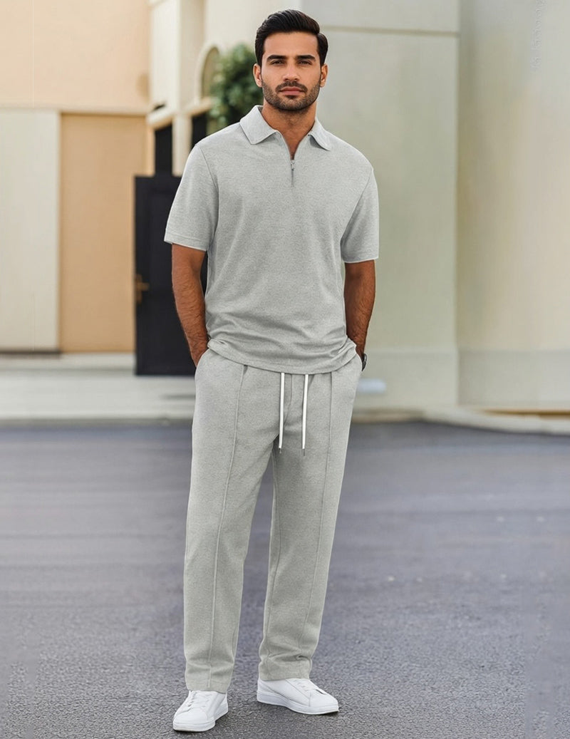 Grey French terry zip-neck polo and jogger set, front view with zip collar and drawstring