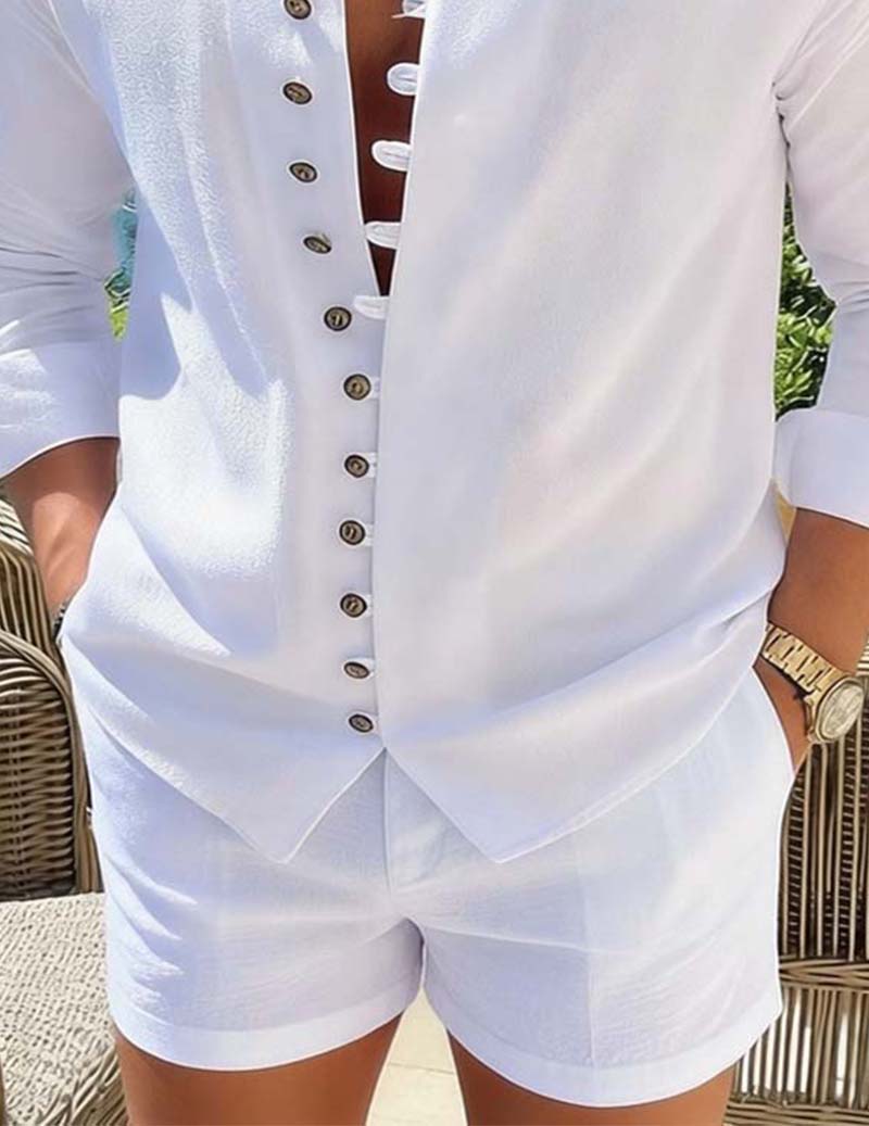 Close-up: white mandarin-collar button shirt with matching shorts