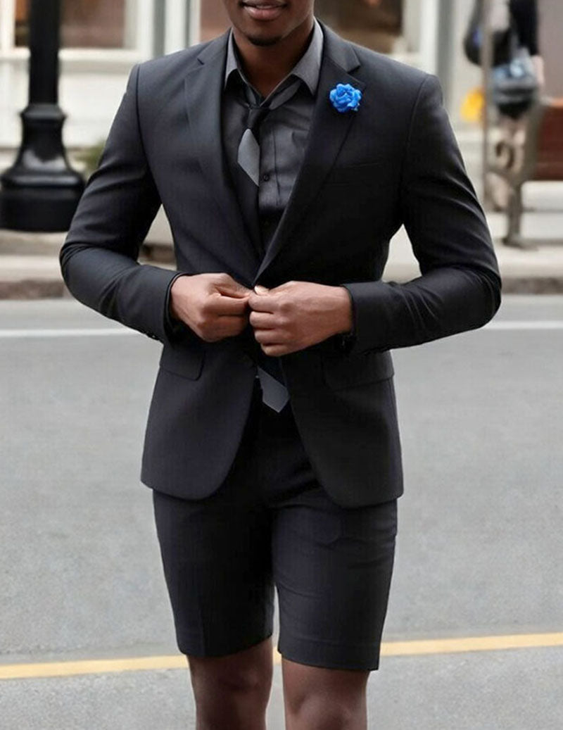 Black blazer and shorts set with blue rosette boutonniere
