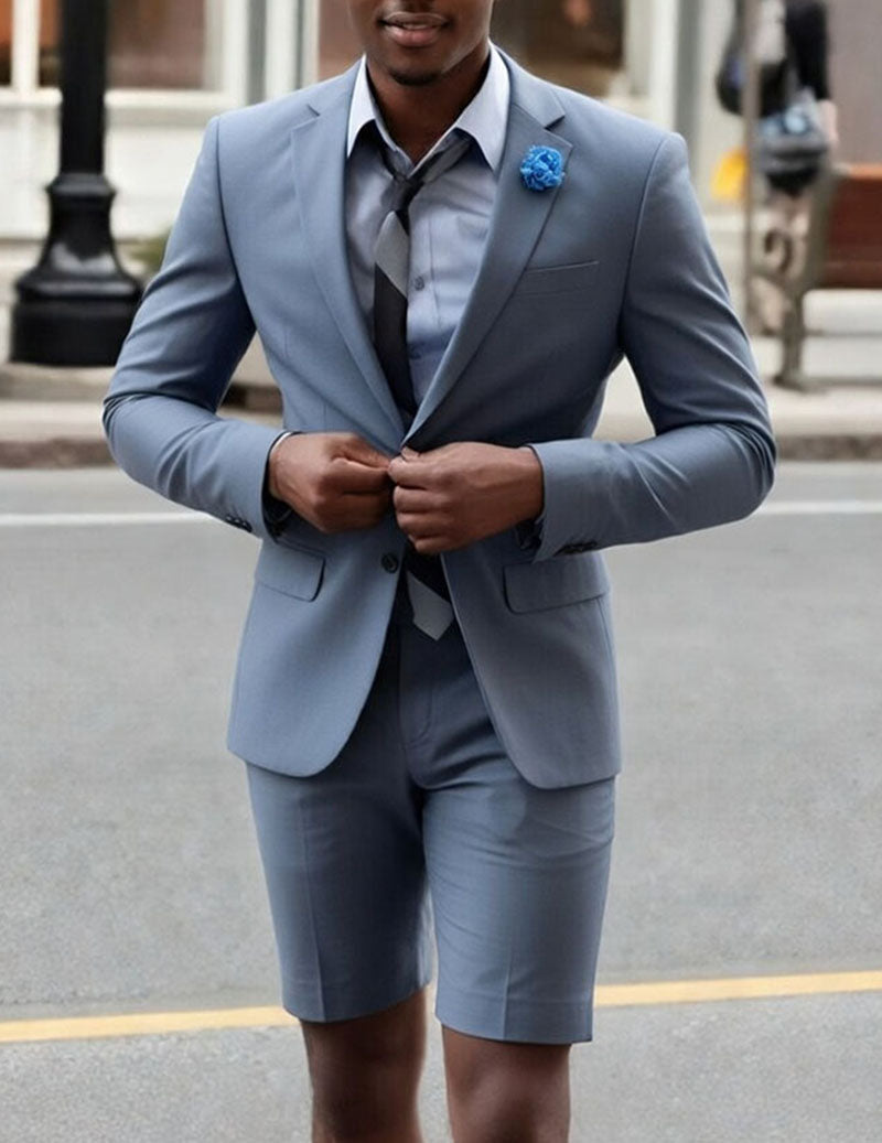 Light grey blazer and shorts set with blue rosette boutonniere