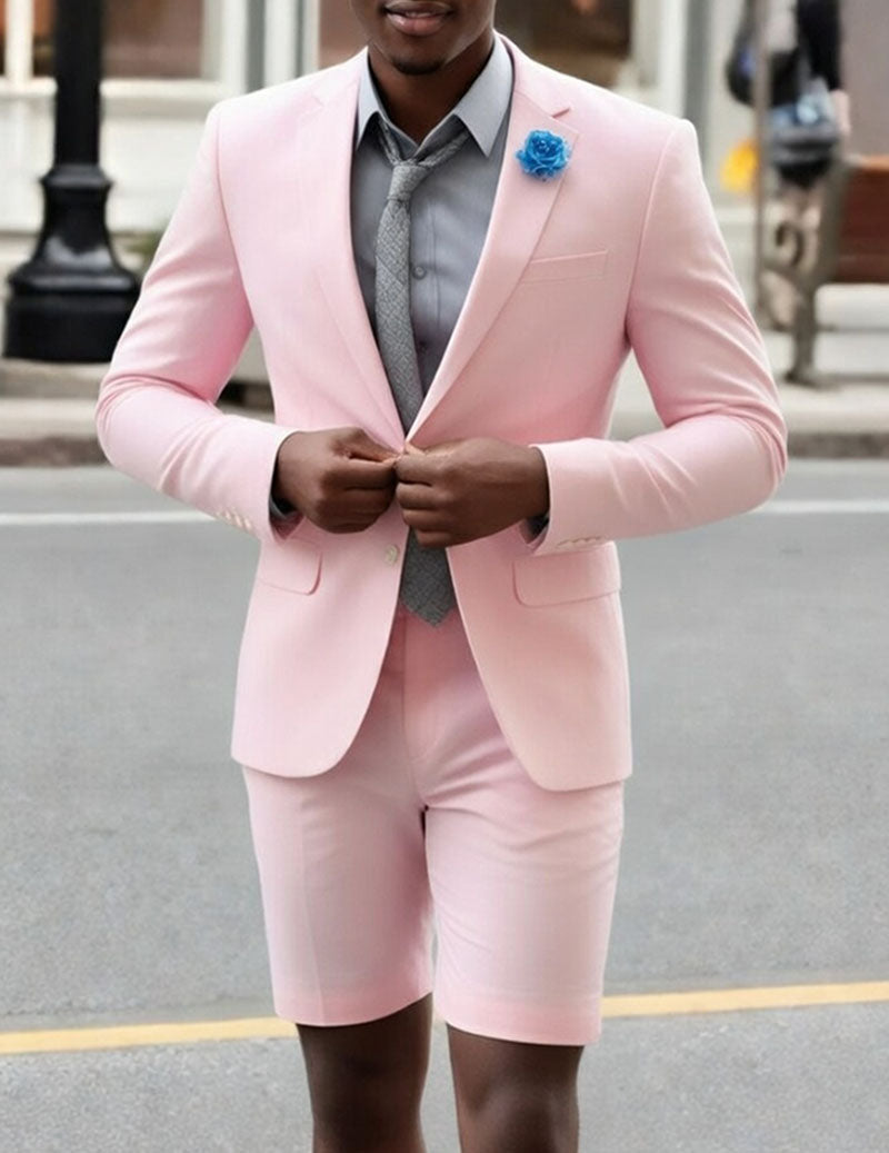 Pink blazer and shorts set with blue rosette boutonniere