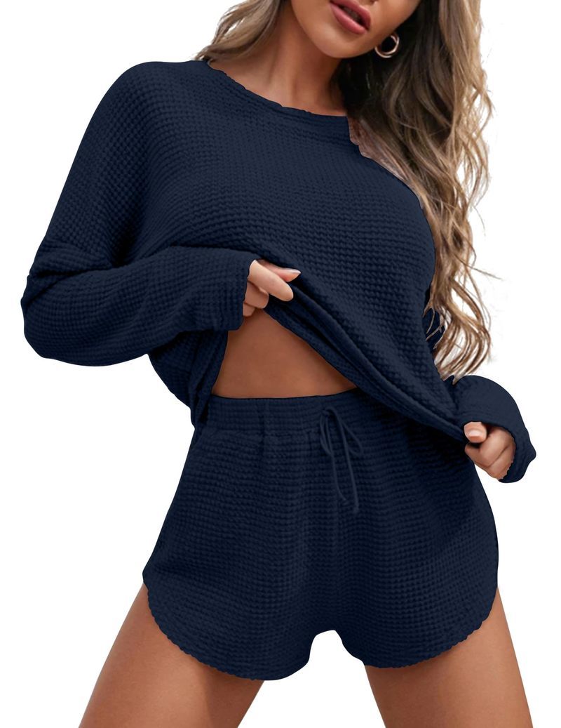 Women's waffle knit pajama set in navy blue, long-sleeve top and drawstring shorts