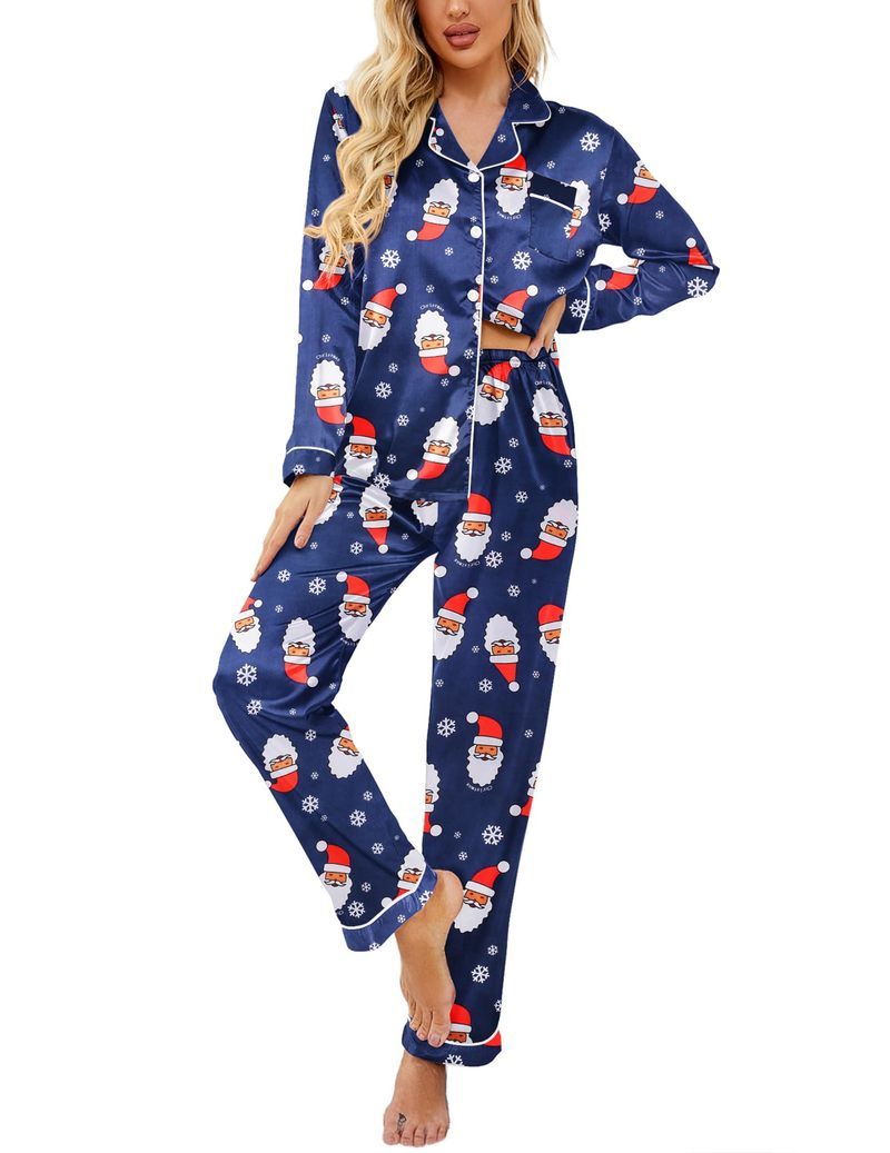 Navy Christmas satin pajama set with white snowflake and red snowman print, button-front top and pants